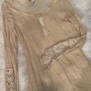 Sheer top perfect for layering.